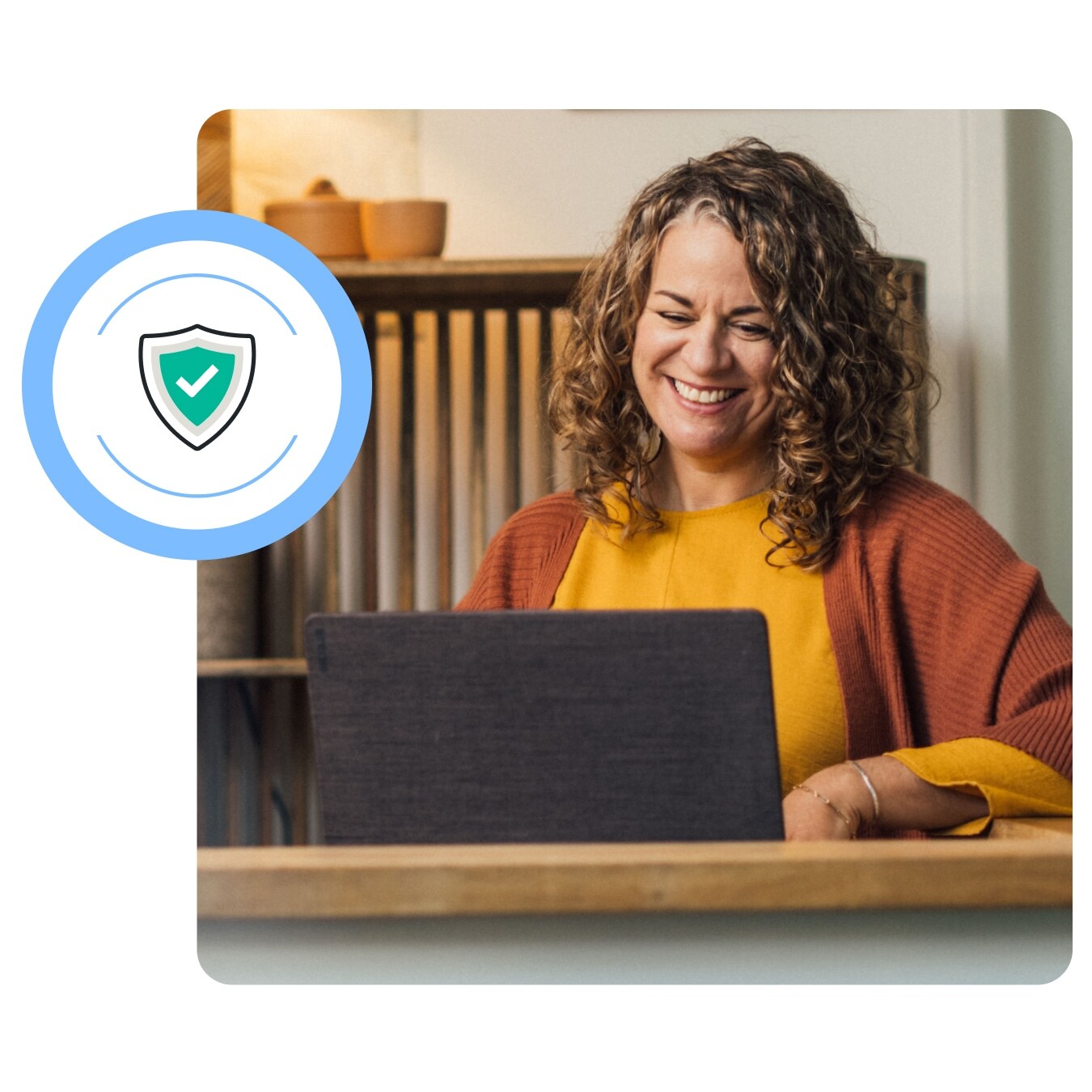 Customer on laptop using included Assisted Business Tax feature, Audit Defense
