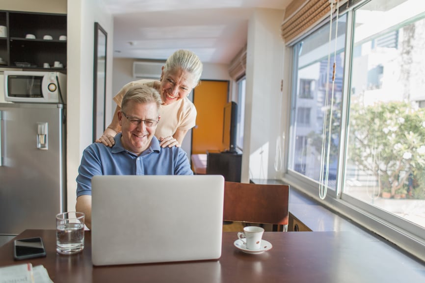 Elderly couple using a laptop computer 