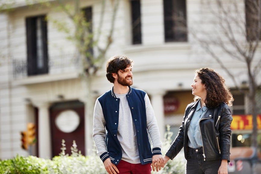 Couple walking and holding hands