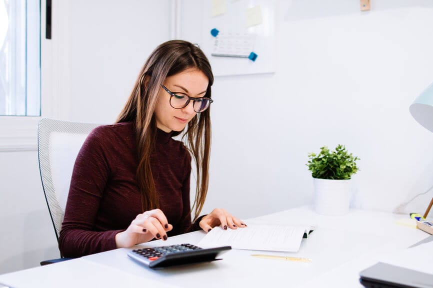 attractive woman doing her taxes