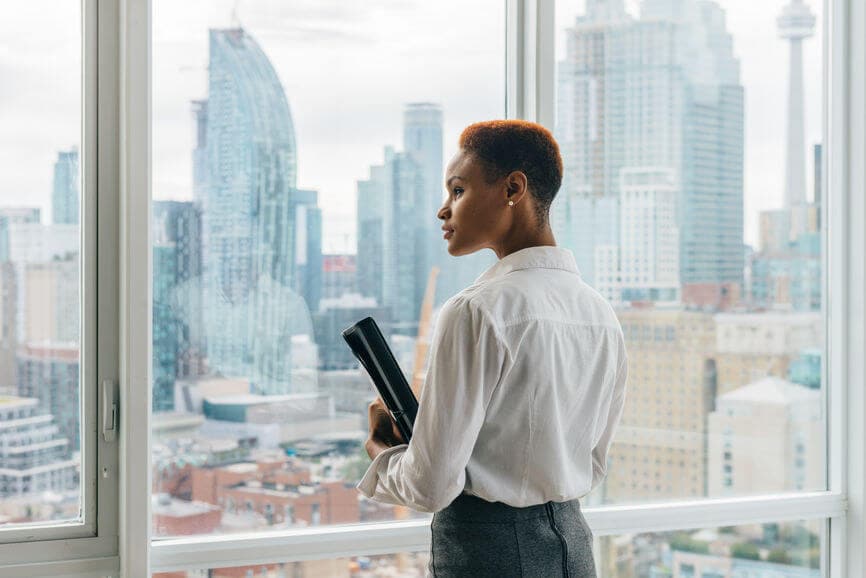 business woman looking out of a window