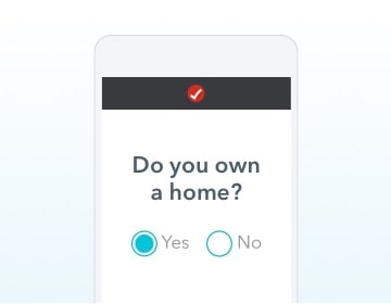 Laptop displaying the “Do you own a home?” screen in TurboTax.