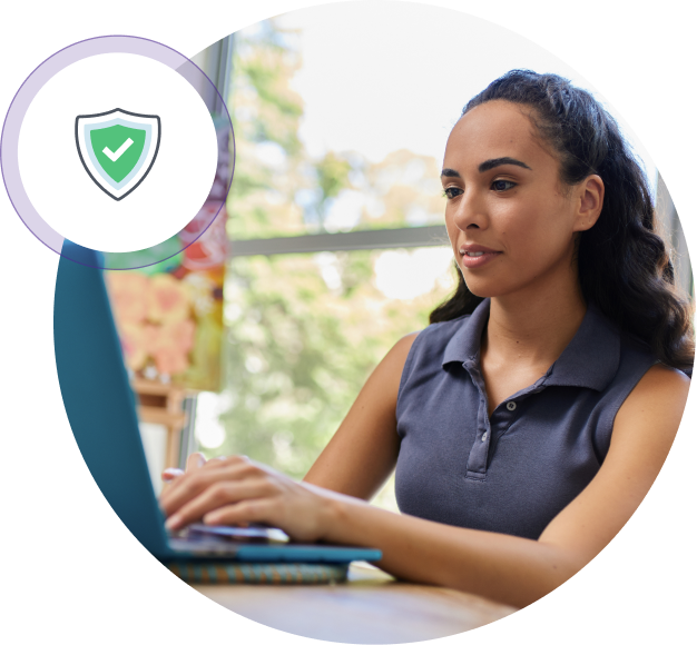 Customer on laptop using included Assisted Business Tax feature, Audit Defense