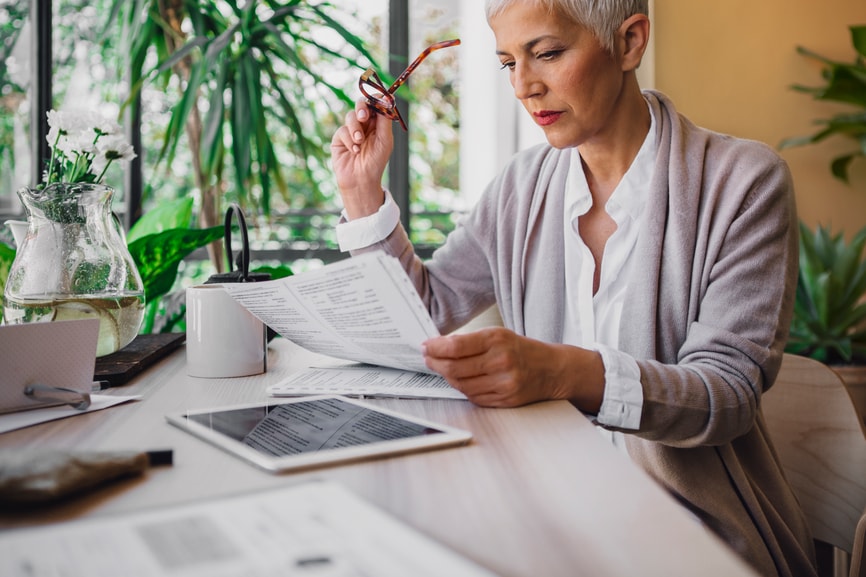 Senior woman reading a letter