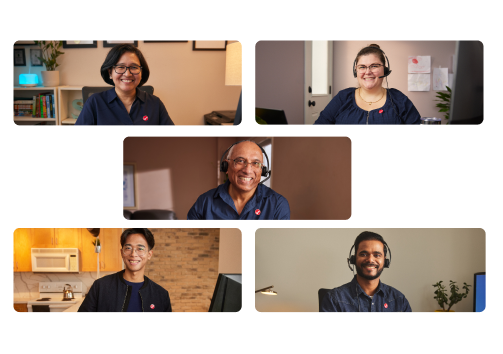 A group of people in office with their smiles on their faces.