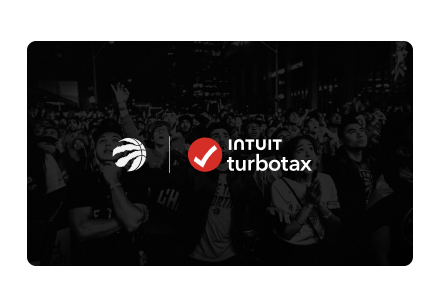 The Toronto Raptors and Intuit TurboTax logos side by side set against a basketball fans background.