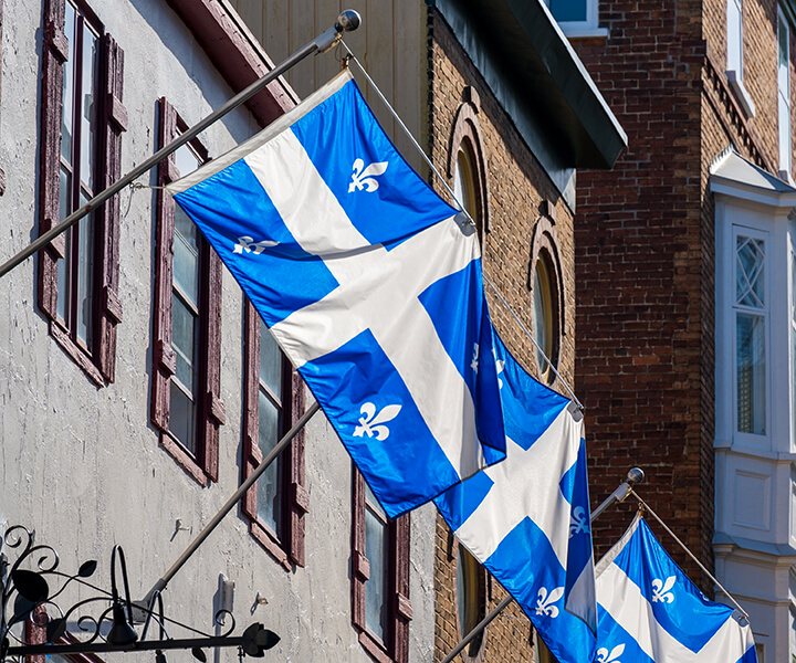 A blue flag is hanging from a pole.