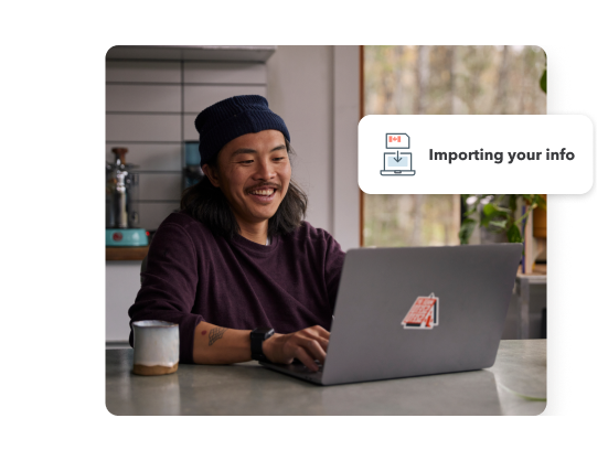 A young man smiling while working on his laptop in his home setting. Secondary illustration with “Importing your info” text and laptop icon.