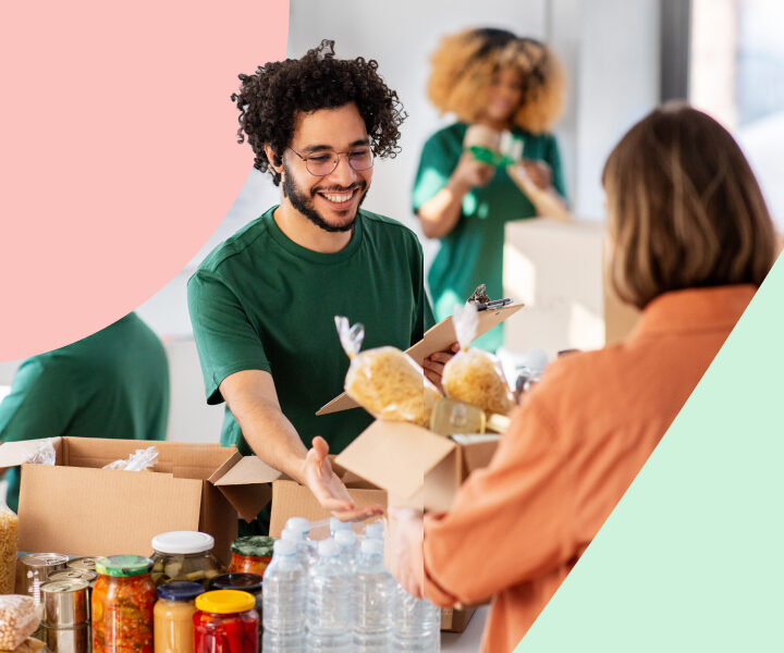 A person holding a box of food and a person holding a box of food.