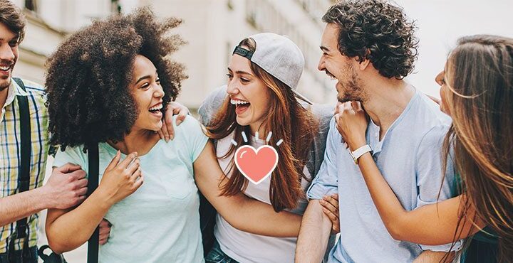 A group of people laughing together.