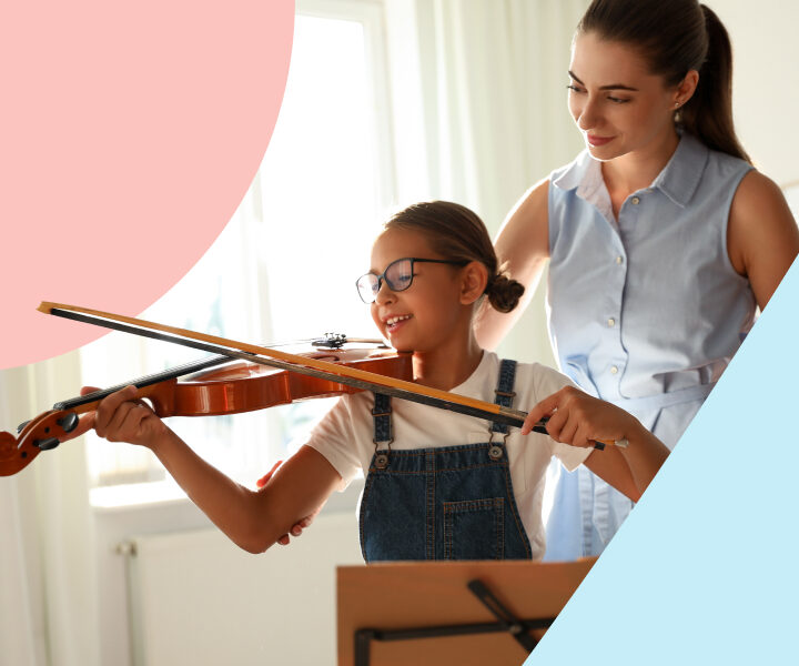 A person and a person playing a violin.