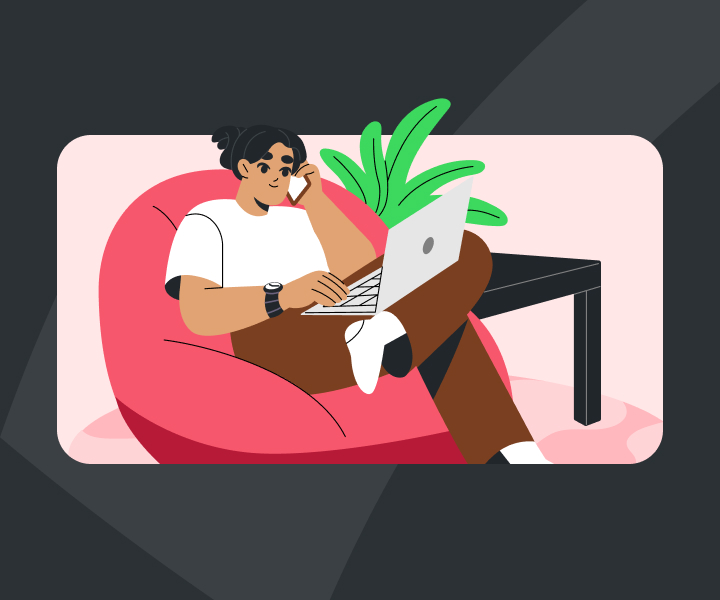 A family sitting together on a couch in a living room.