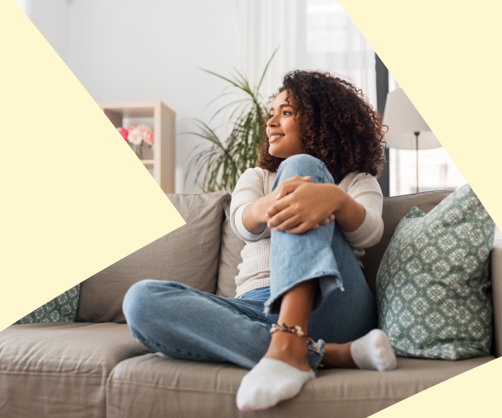 A person sitting on a couch. 