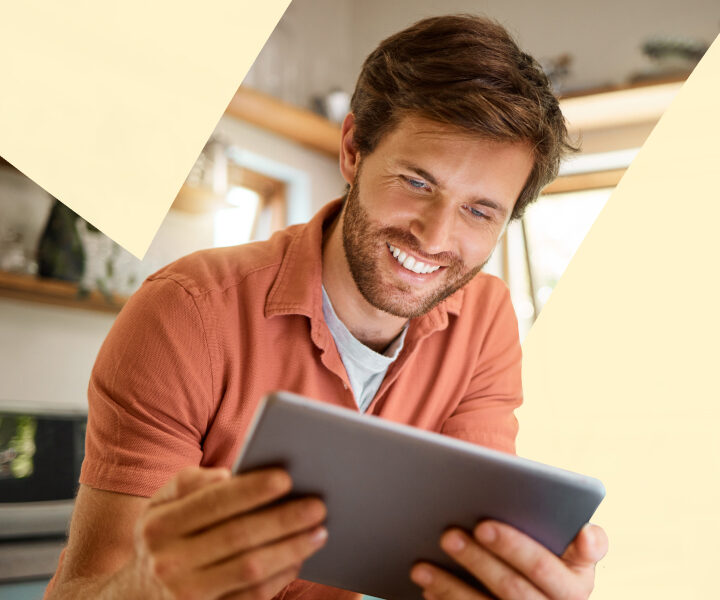 A person with a laptop in his hands.