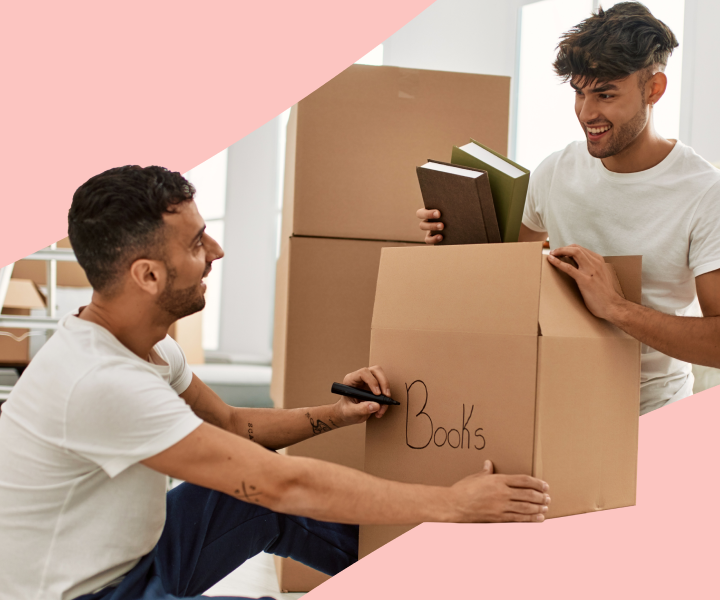 Two people are holding a box together.