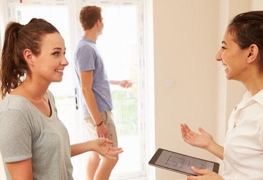 woman talking to another woman