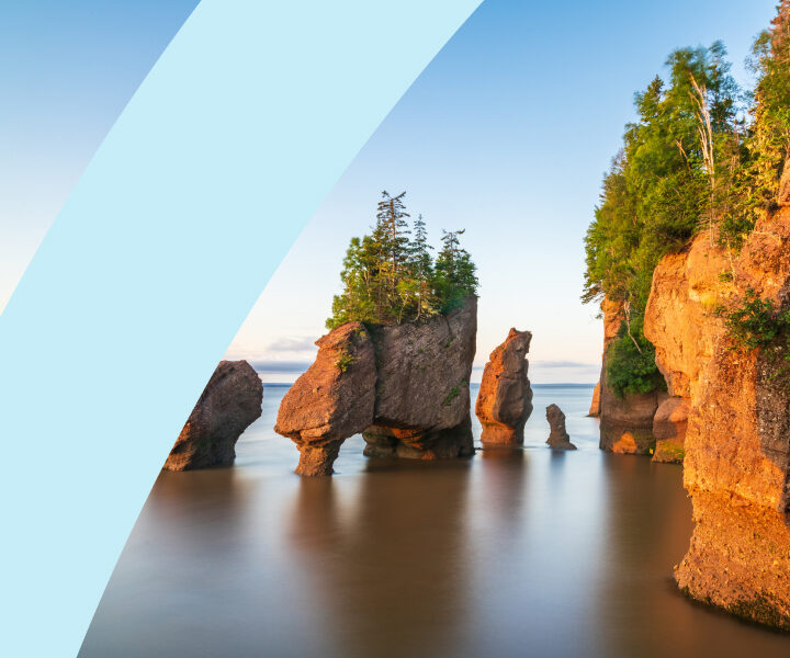 A picture of a rock formation with trees in the background.