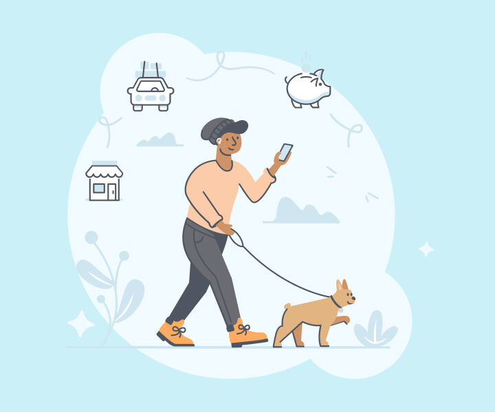 A picture of a person walking a dog on a leash.