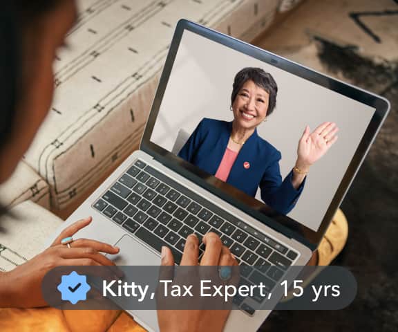 Kitty, a tax expert with 15 years of experience, guides a user through a live video chat.