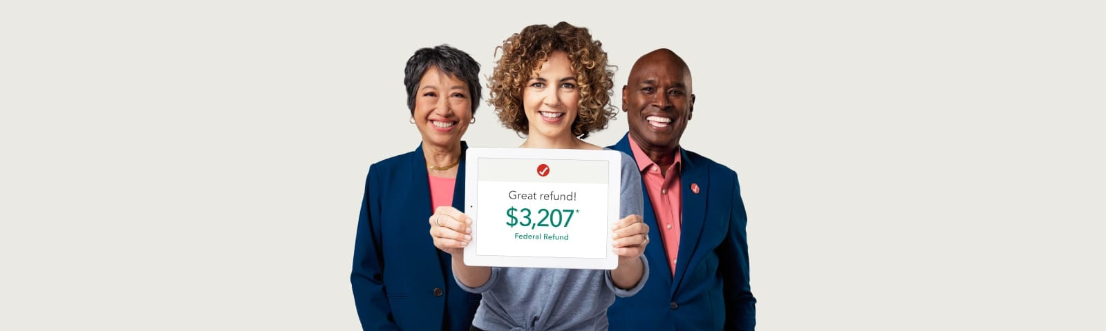 A TurboTax user and two tax experts show off a great refund. 