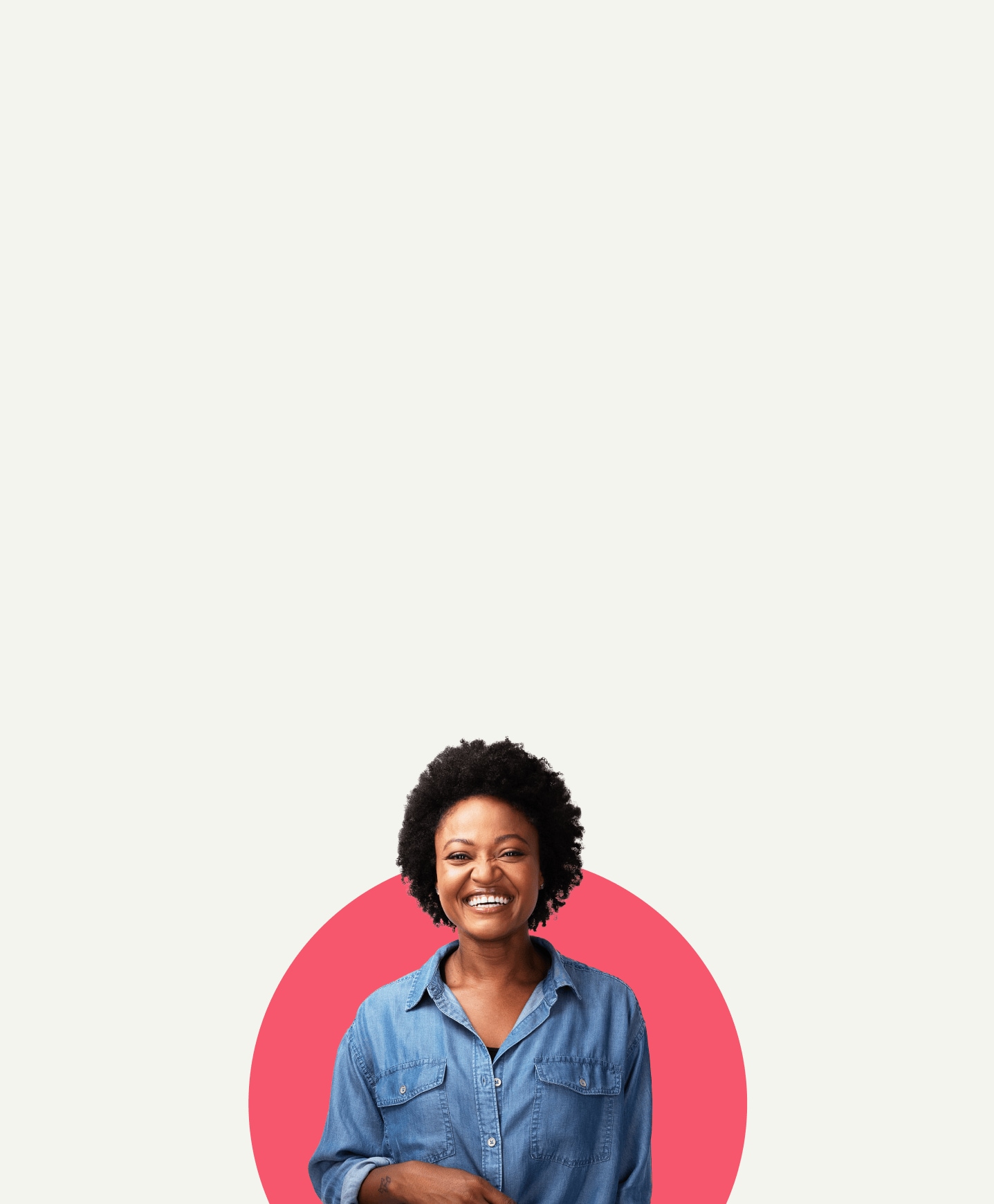 TurboTax customer standing in front of a red backdrop