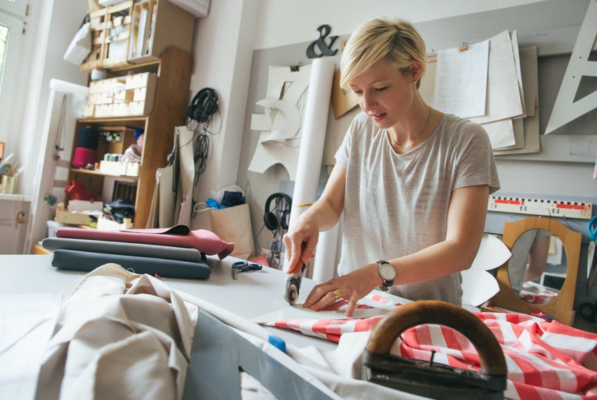 Seamstress using a rotary cutter