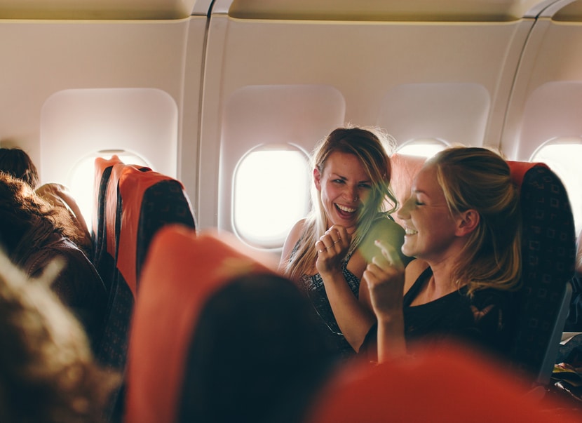 Two women on an airplane