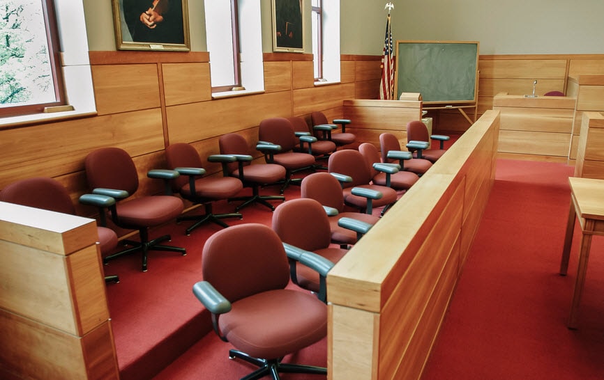 Empty jury box in a courtroom