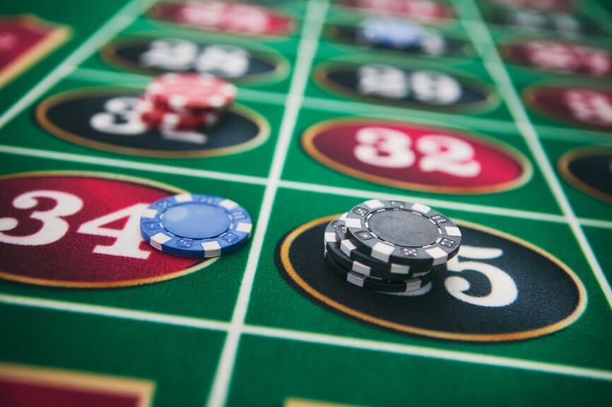 Casino Roulette table with chips.