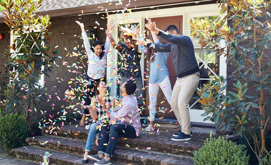 Happy family celebrating buying a home