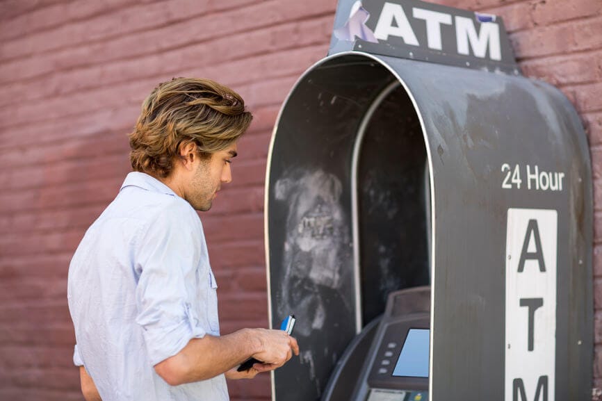 man at an ATM machine