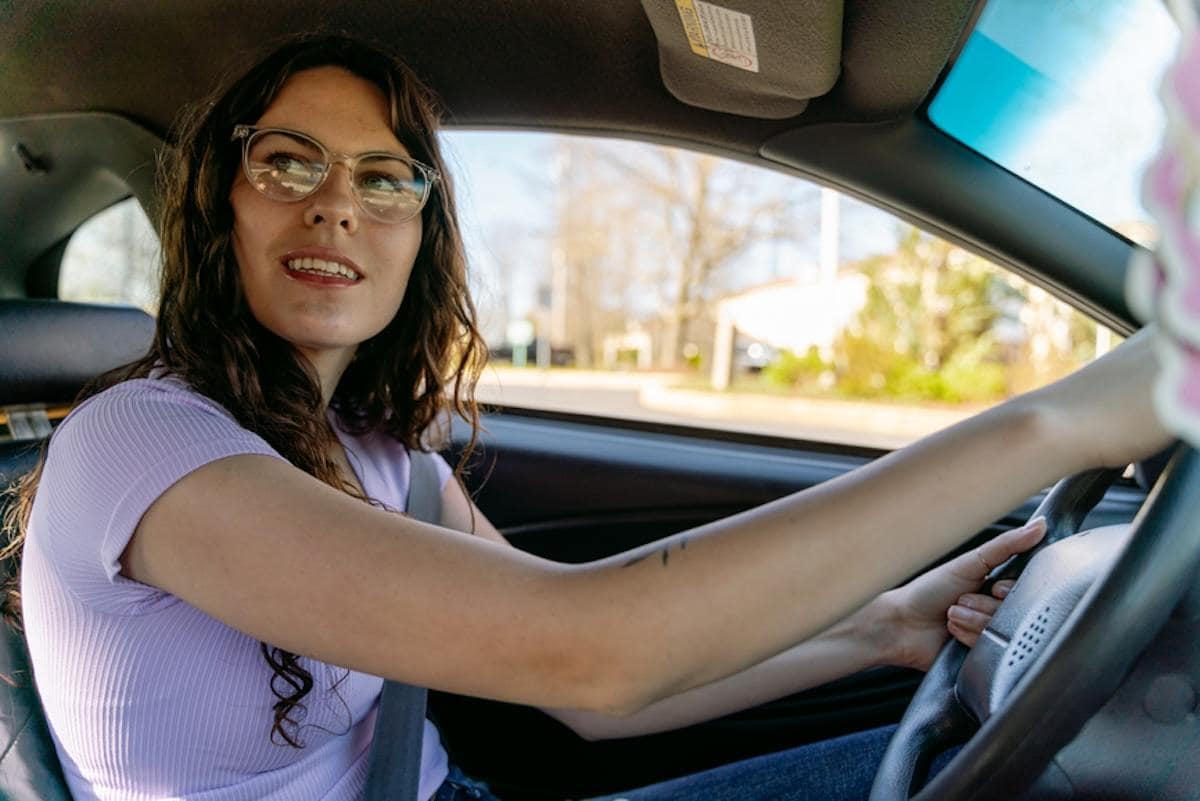 A person driving a car.