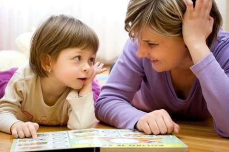 Mother and daughter reading together