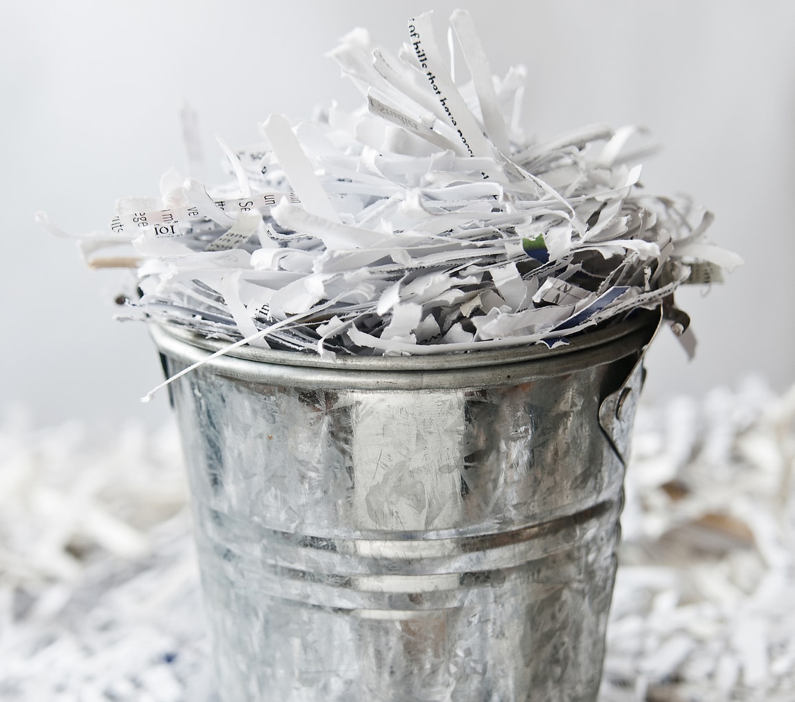 Bucket of shredded paper
