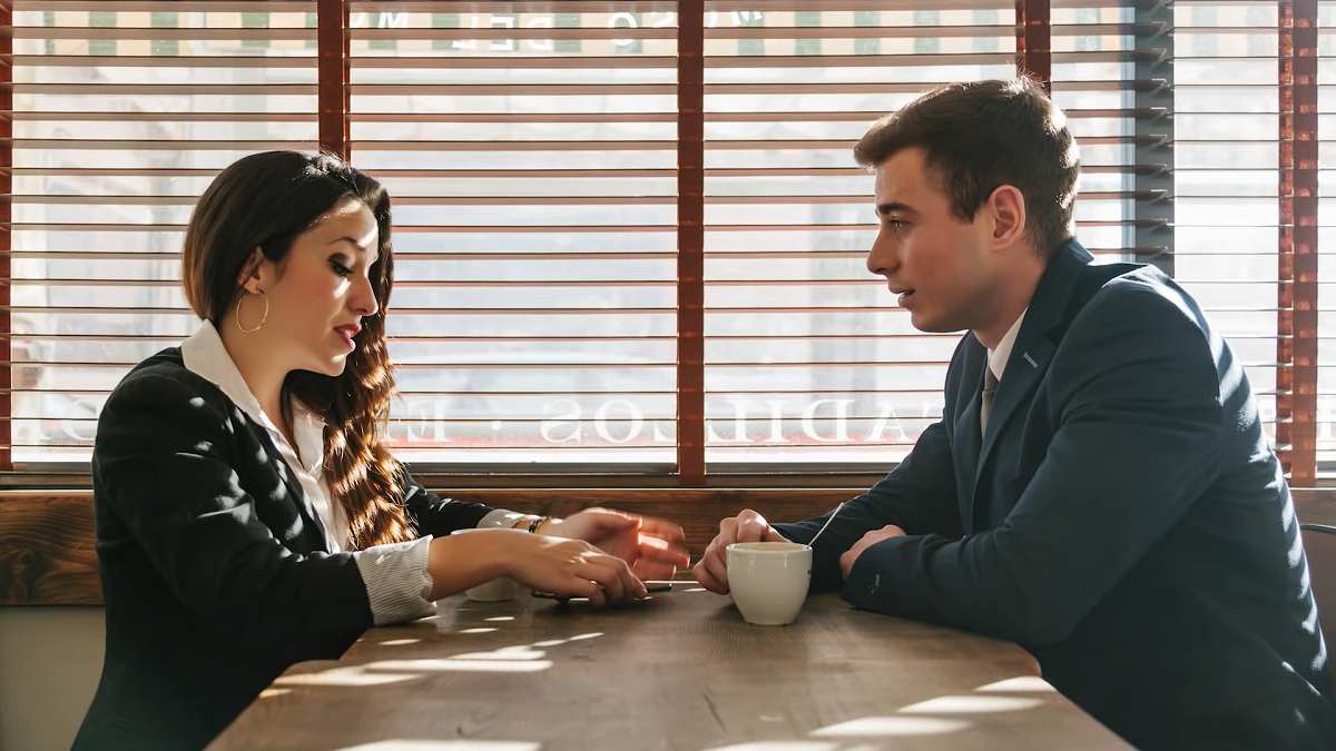a couple meeting at a coffee shop