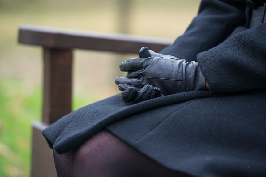 Woman in all black for funeral mourning