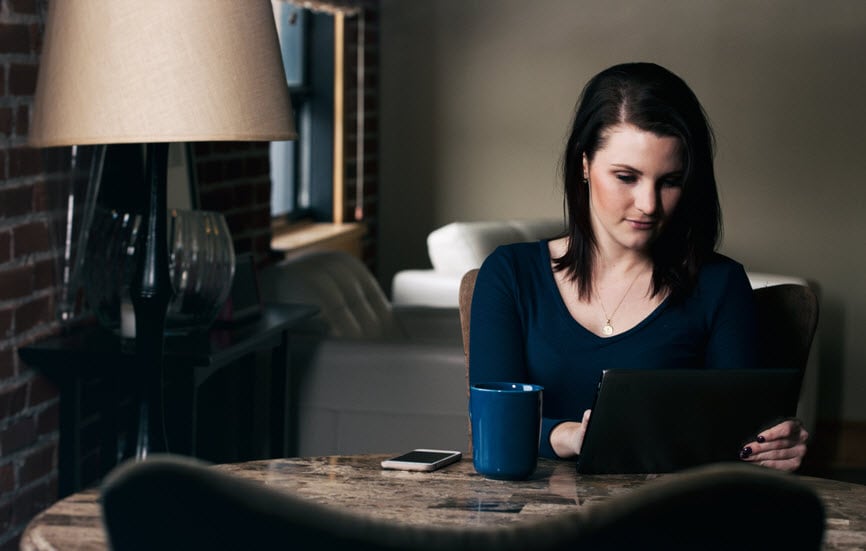 Woman reading on a tablet