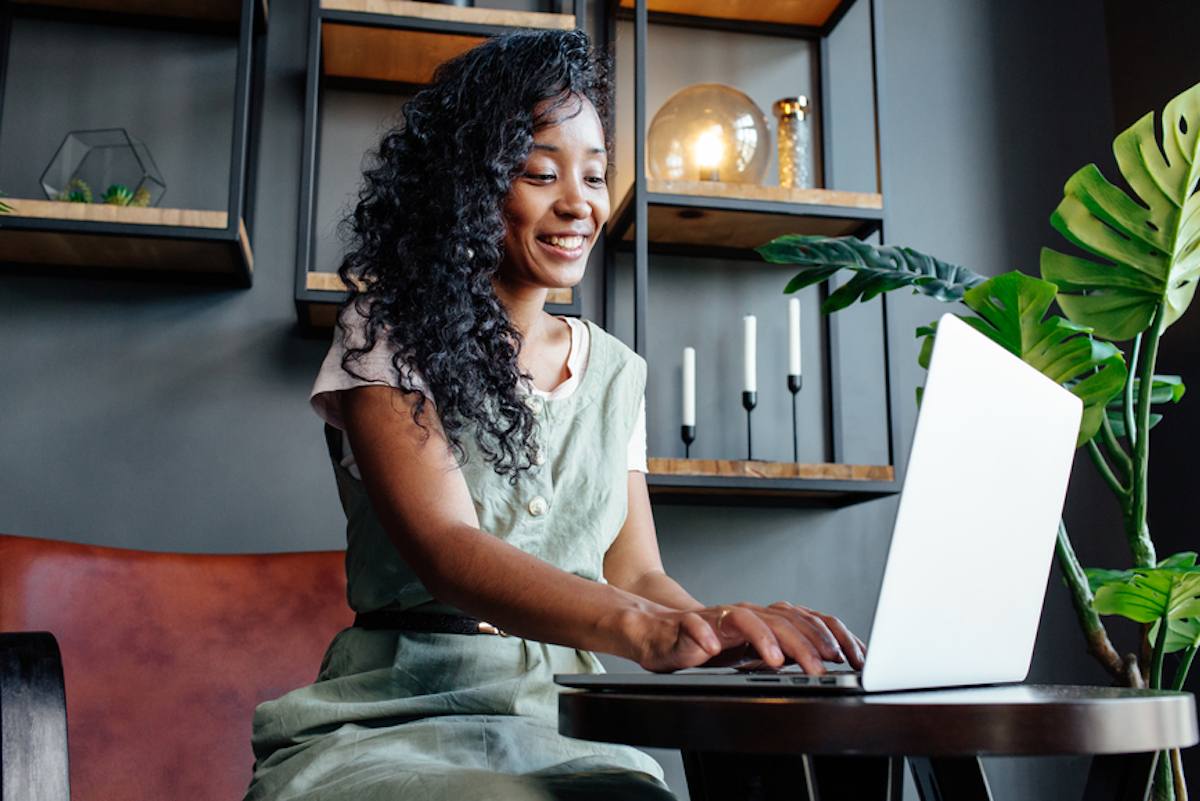 person typing on laptop