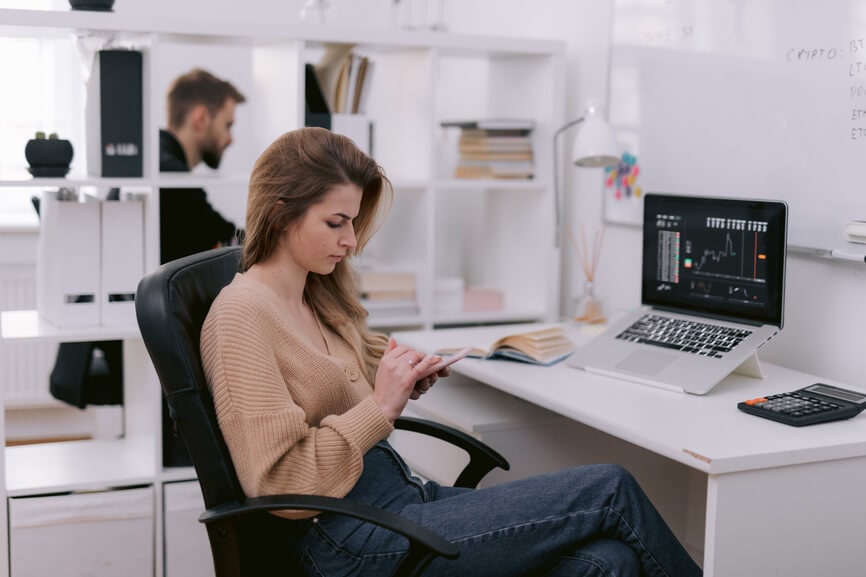 Person sitting at desk in office