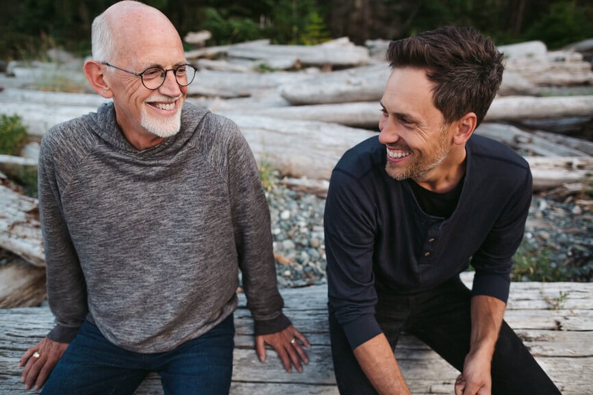 Senior father and his son enjoying time together outdoors.