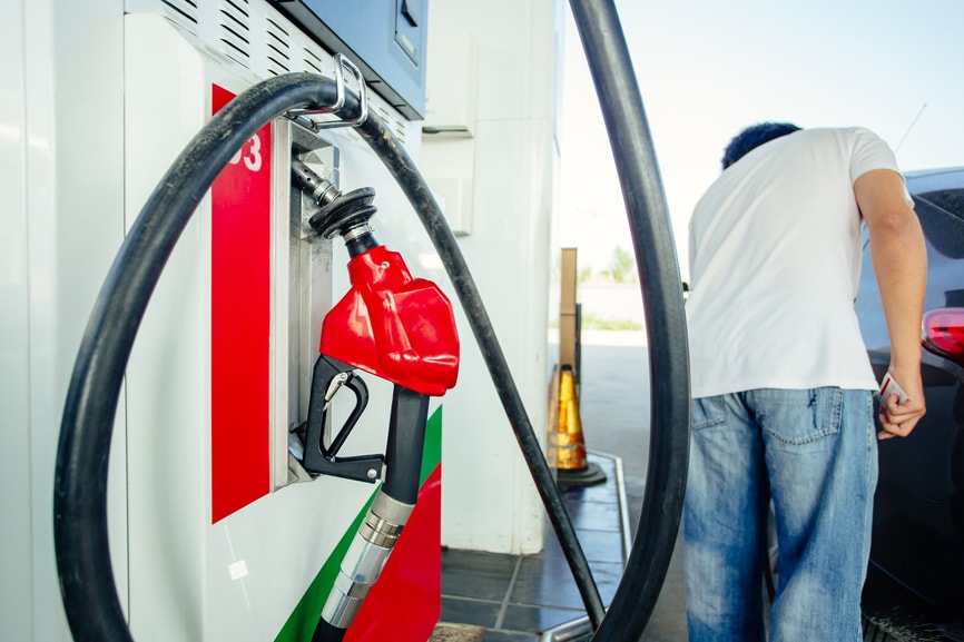 Man filling up at gas station