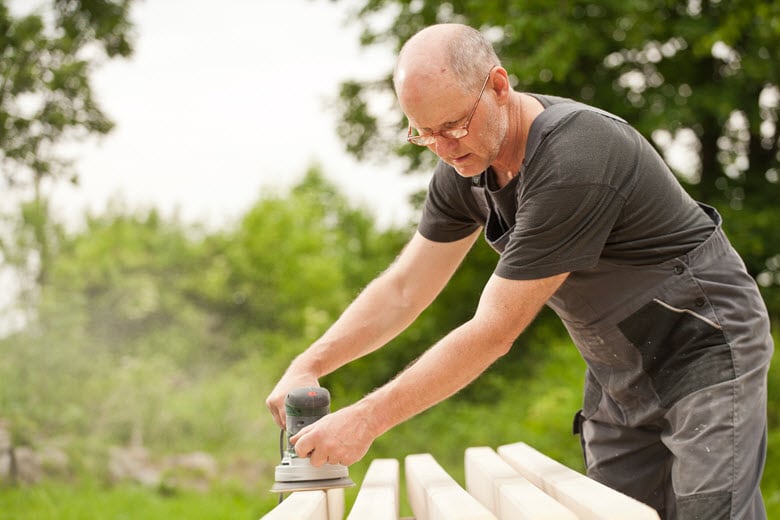 Taskrabbit Tasker sanding wood