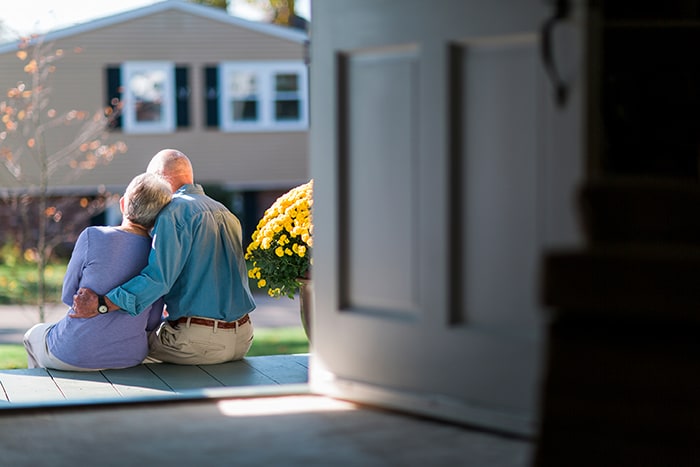 Senior couple sitting on the porch
