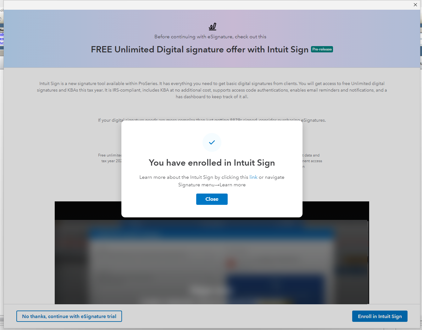 A computer screen with a You have enrolled in Intuit sign. and a close button