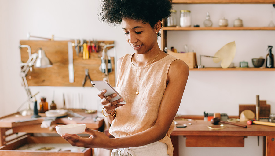 A woman trying out small business advertising ideas 