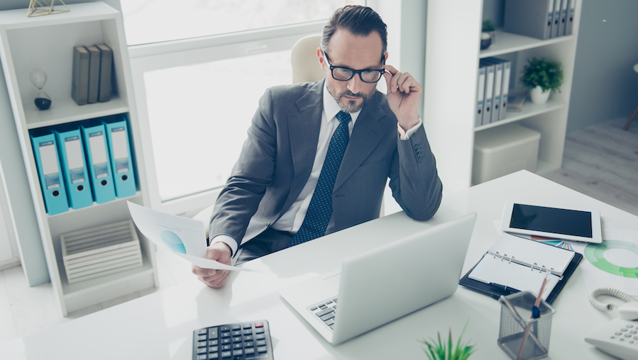 Bookkeeper strategizing for his clients.