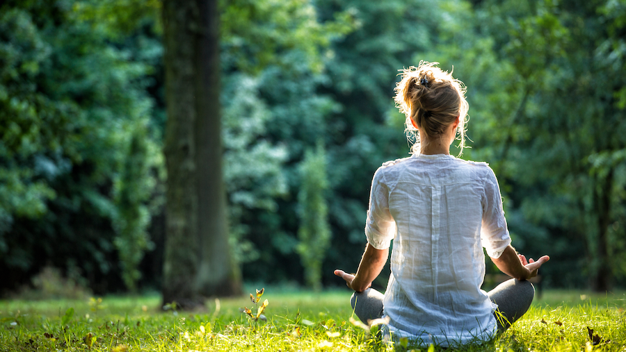 Woman practicing yoga.