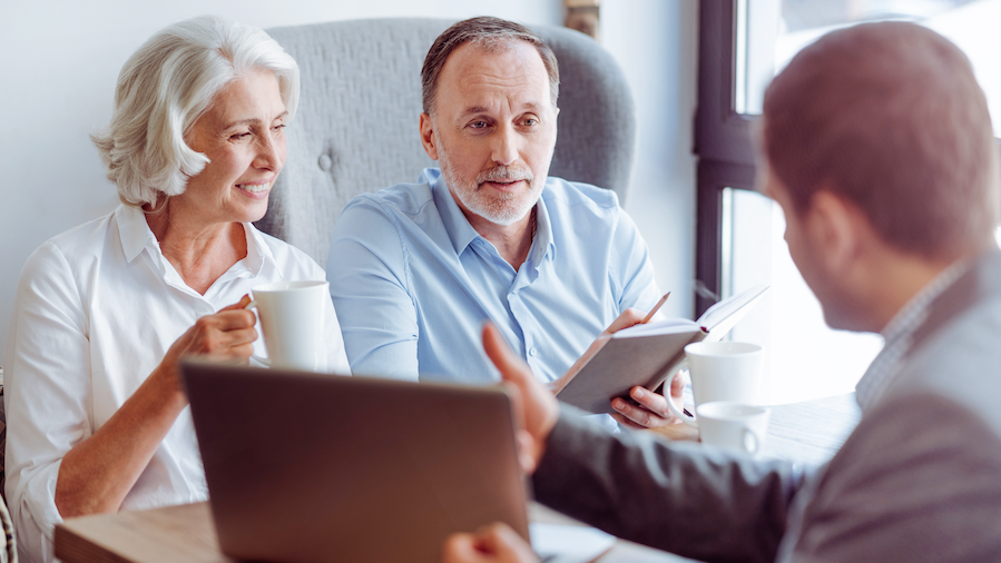 A trusted advisor breaking down Social Security benefits with a couple.