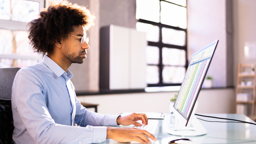 Accountant reviewing recurring transactions in QuickBooks.