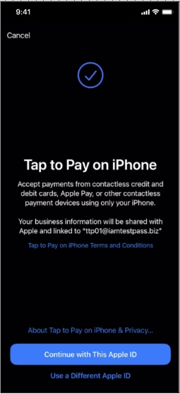 A couple of people that are holding an apple device.